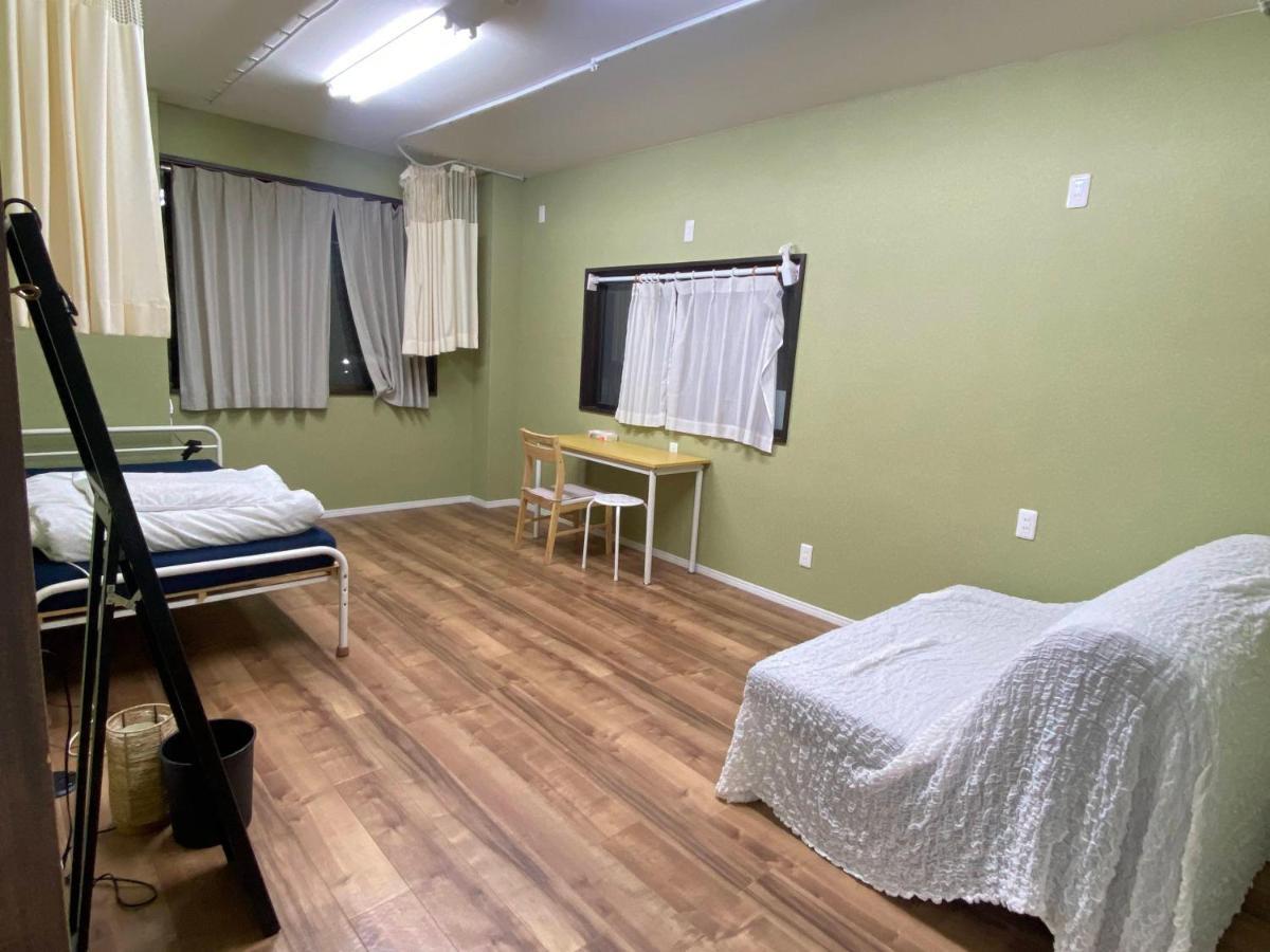 Bonfire Hostel Osaka Bagian luar foto