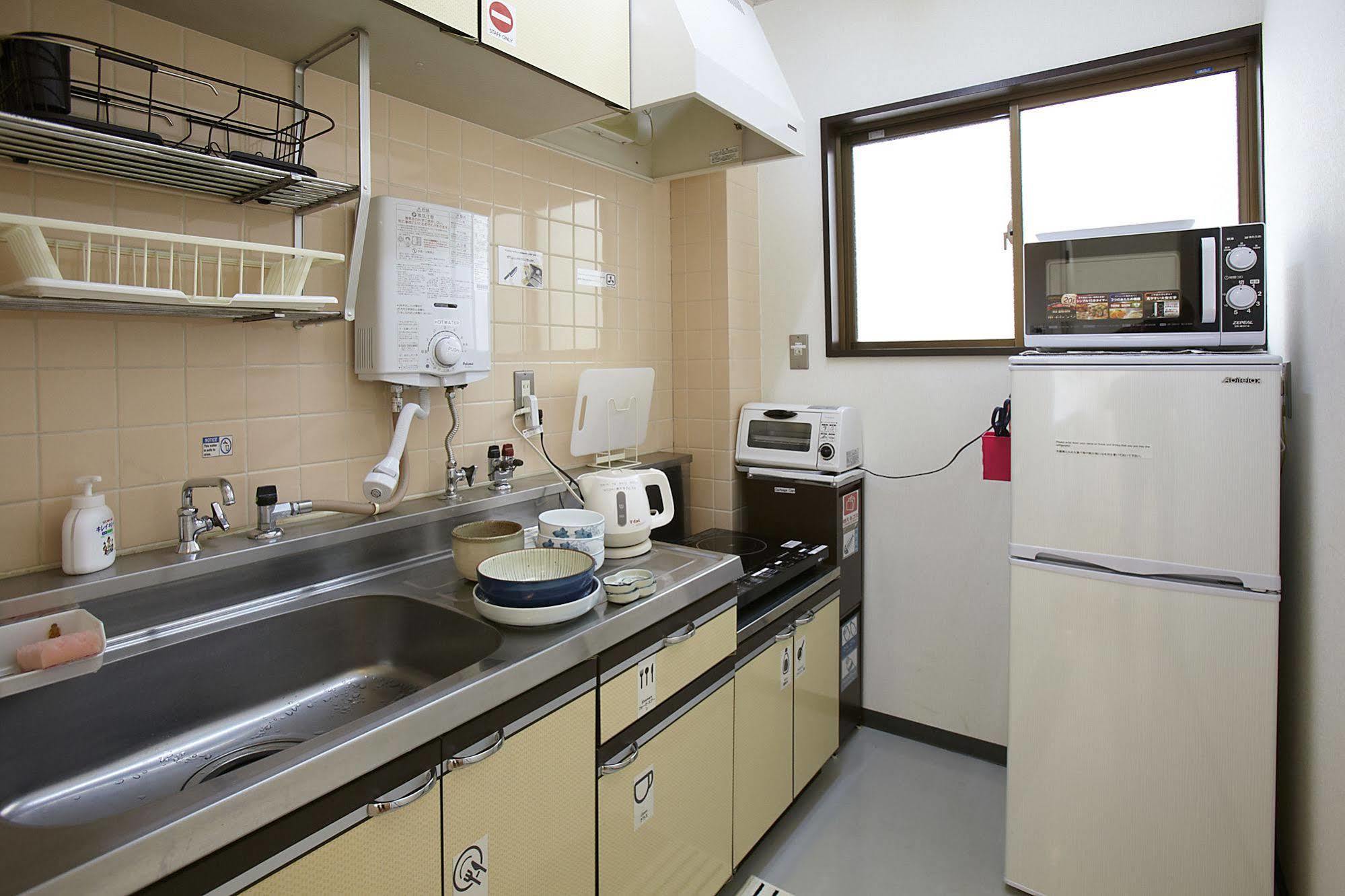 Bonfire Hostel Osaka Bagian luar foto